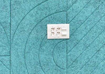 Soluzione acustica di design dettaglio finiture interruttori luce